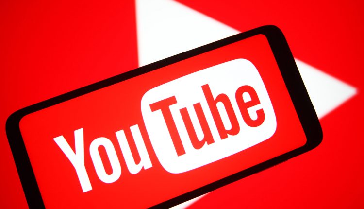 In this photo illustration a YouTube logo of an online video